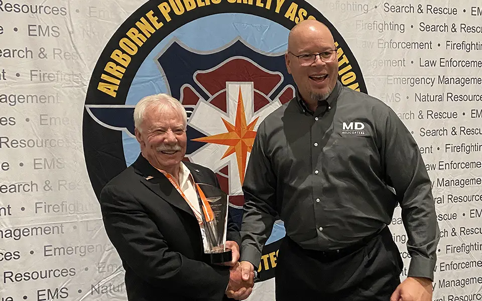 Mike Atwood Receives APSA Safety Award from Jack Harris at MD Helicopters