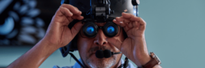 Pilot wearing E3 night vision goggles