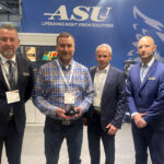 ASU Inc., Skytec AS and Norwegian Air Ambulance representatives celebrate new contract for 14 E3 night vision goggles and five night vision cockpit modifications.