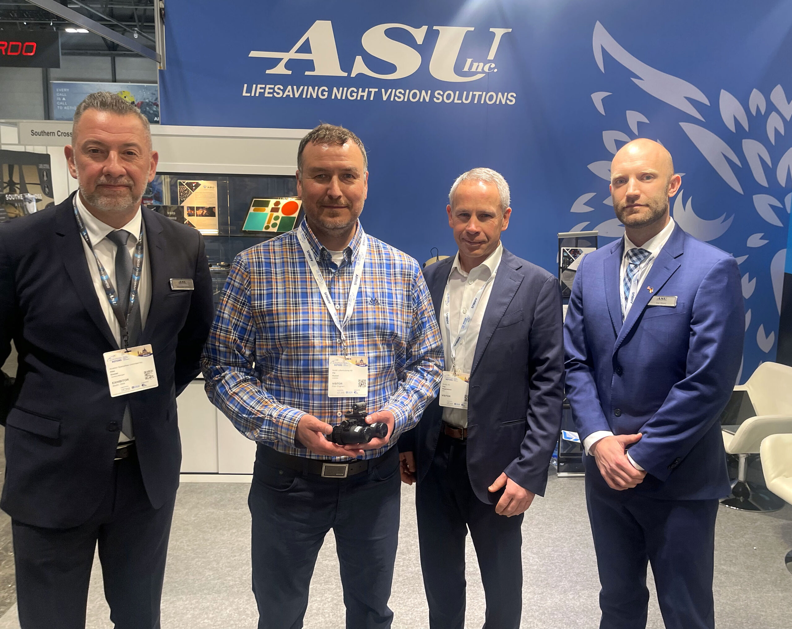ASU Inc., Skytec AS and Norwegian Air Ambulance representatives celebrate new contract for 14 E3 night vision goggles and five night vision cockpit modifications.